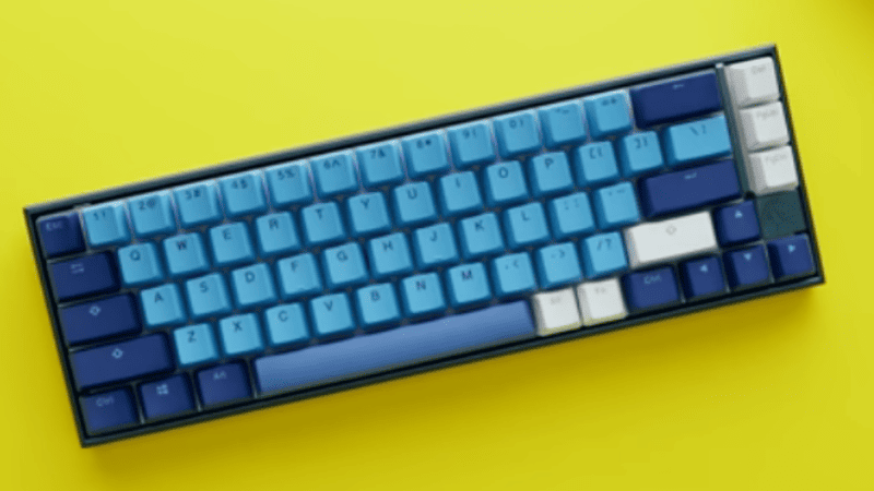 65% keyboard layout compact with arrow keys and minimal navigation cluster